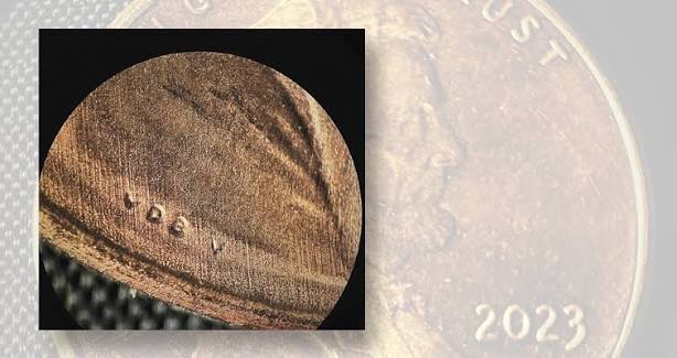 Close-up of 2023 penny Extra V VDBV variety showing extra V letter next to VDB initials