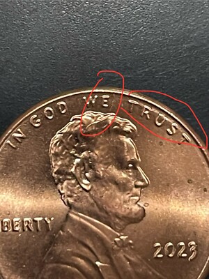 Close-up of 2023 penny BIE die crack error showing raised crack between B and E in LIBERTY